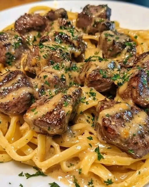 Garlic Butter Steak with Cheesy Herb Pasta: A Savory Feast for the Senses