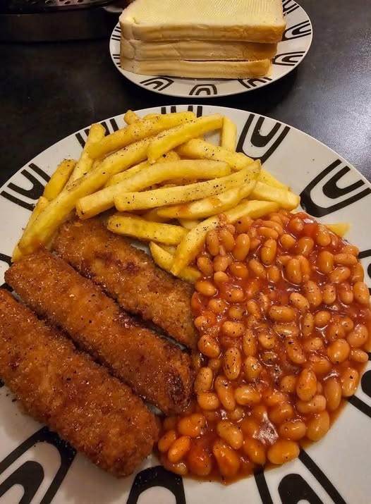 Jumbo Fish Fingers, Chips, Beans, and Bread and Butter: A Classic Comfort Meal