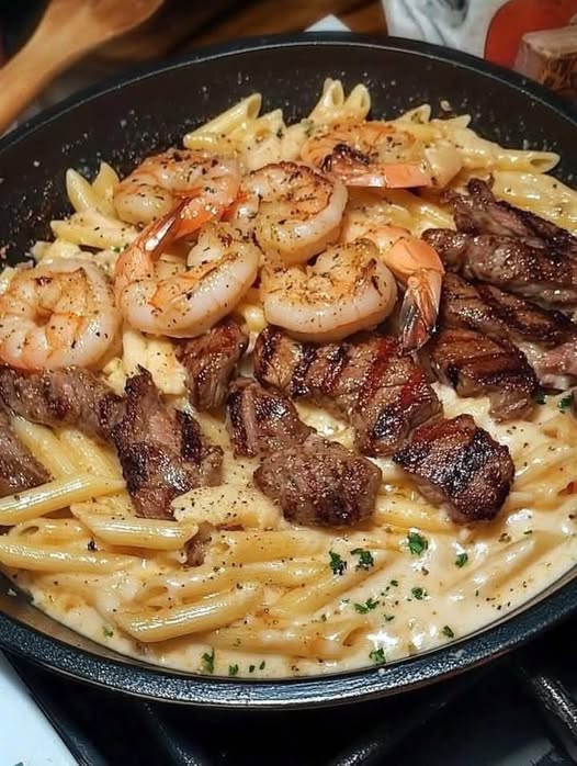 Creamy Garlic Parmesan Pasta with Steak & Shrimp: A Luxurious Surf and Turf Delight