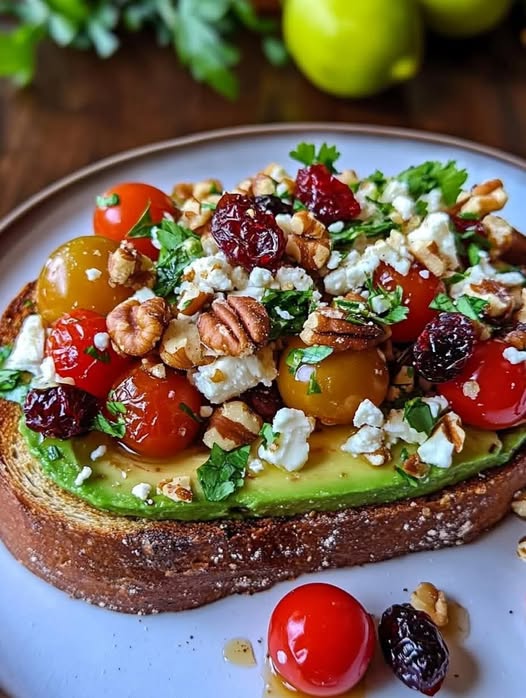 Avocado Toast with Feta Cheese, Cherry Tomatoes, Cranberries, and Walnuts