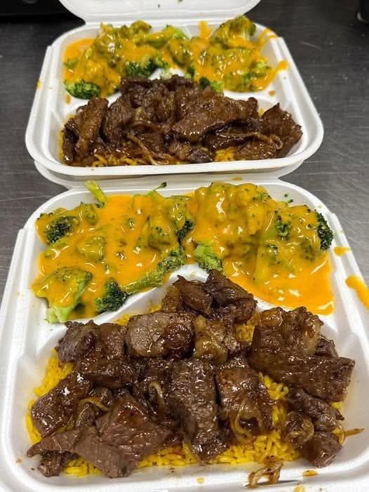 Tender Ribeye Steak Tips Over Cheesy Broccoli Rice